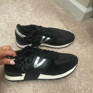 Black and silver Tretorn sneakers with cheetah print. Worn 2 maybe 3 times